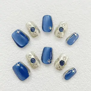 Blue Bucherati press-on nails
